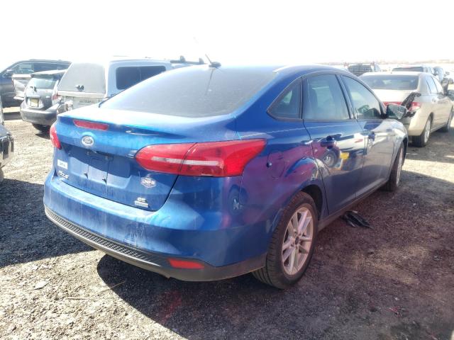 Photo 3 VIN: 1FADP3FE4JL312538 - FORD FOCUS SE 