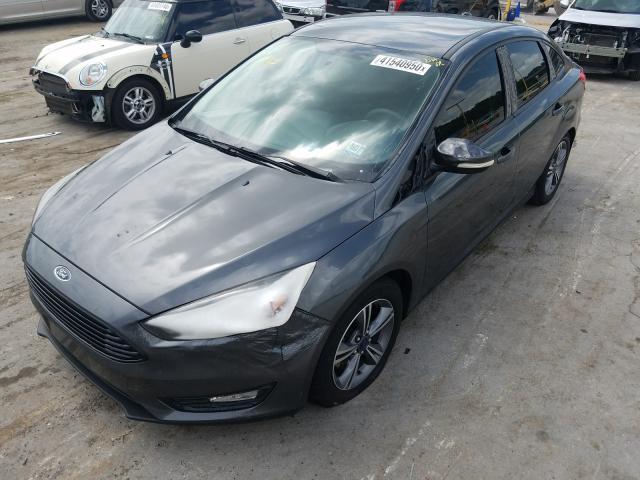 Photo 1 VIN: 1FADP3FE5HL202091 - FORD FOCUS SE 