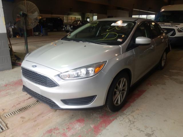 Photo 1 VIN: 1FADP3FE5JL200749 - FORD FOCUS SE 