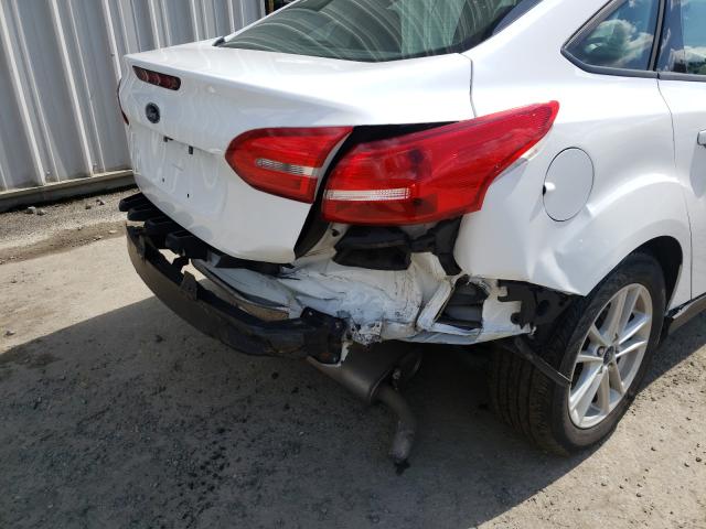 Photo 8 VIN: 1FADP3FE5JL215218 - FORD FOCUS SE 