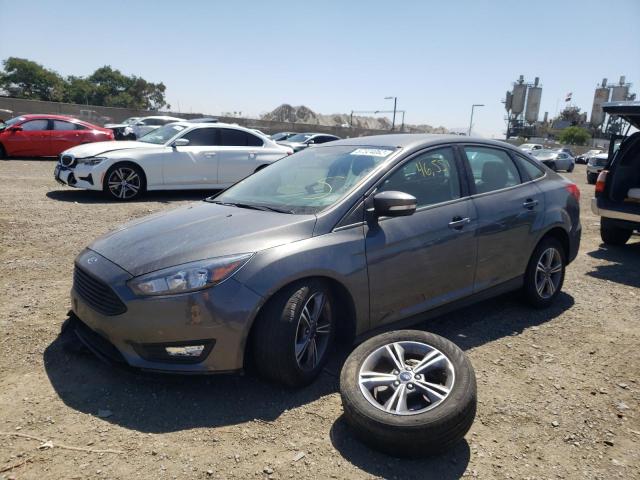 Photo 1 VIN: 1FADP3FE5JL310636 - FORD FOCUS SE 