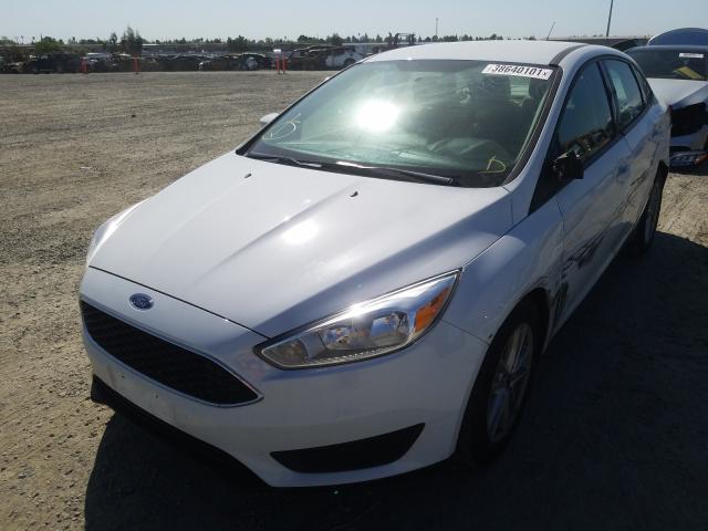 Photo 1 VIN: 1FADP3FE5JL322947 - FORD FOCUS SE 