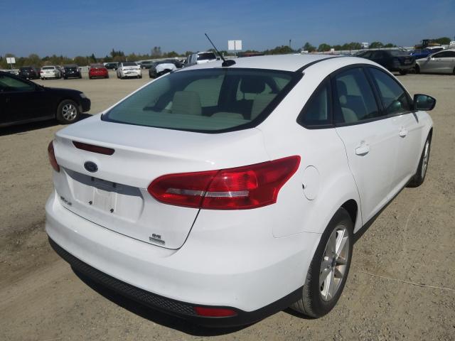 Photo 3 VIN: 1FADP3FE5JL322947 - FORD FOCUS SE 