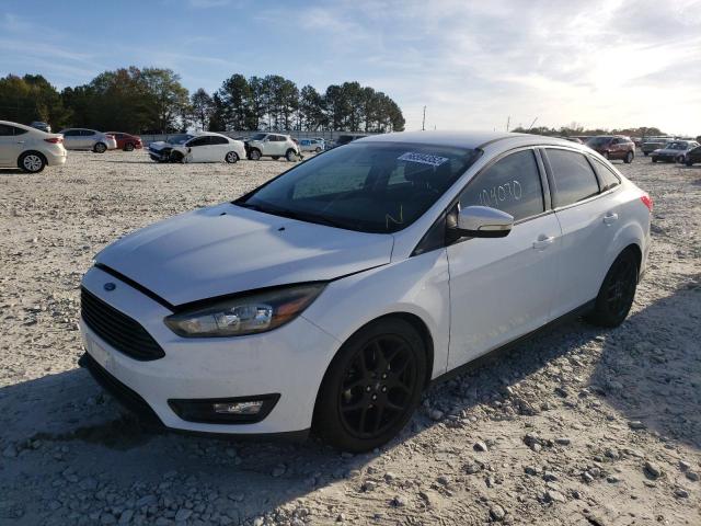 Photo 1 VIN: 1FADP3FE6GL337093 - FORD FOCUS SE 