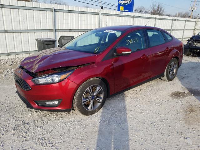 Photo 1 VIN: 1FADP3FE6HL309814 - FORD FOCUS SE 