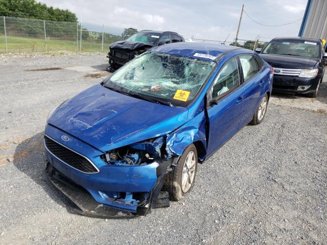 Photo 1 VIN: 1FADP3FE6JL329924 - FORD FOCUS SE 