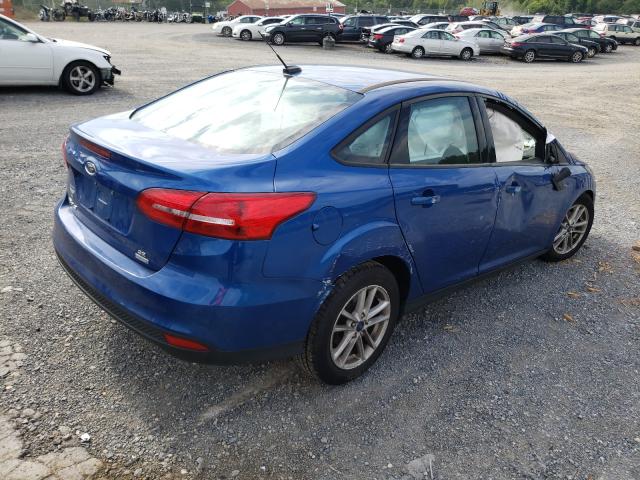 Photo 3 VIN: 1FADP3FE6JL329924 - FORD FOCUS SE 