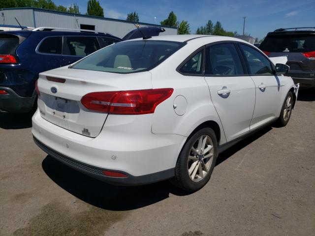 Photo 3 VIN: 1FADP3FE7FL257090 - FORD FOCUS SE 