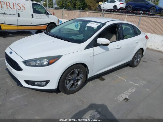 Photo 1 VIN: 1FADP3FE7GL238735 - FORD FOCUS 