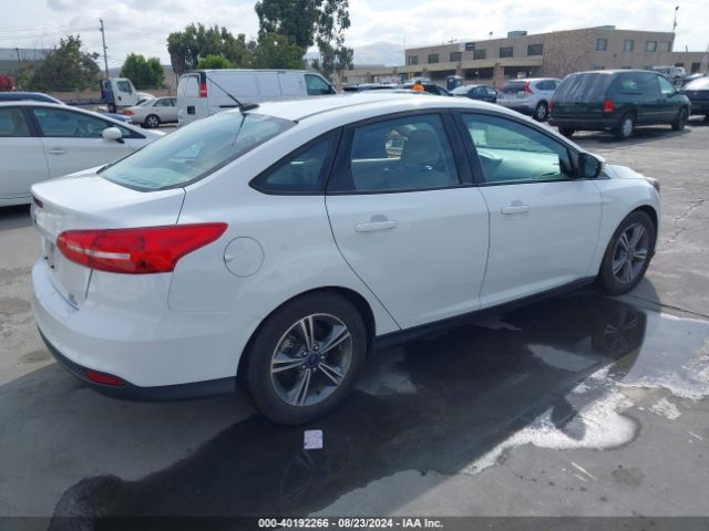 Photo 3 VIN: 1FADP3FE7GL238735 - FORD FOCUS 