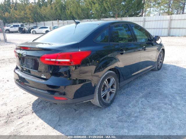 Photo 3 VIN: 1FADP3FE7GL387193 - FORD FOCUS 