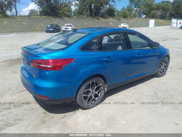 Photo 3 VIN: 1FADP3FE7HL205588 - FORD FOCUS 