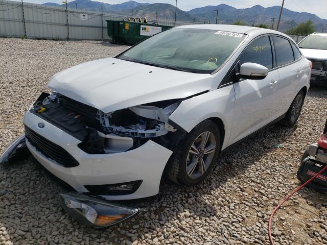 Photo 1 VIN: 1FADP3FE7HL245279 - FORD FOCUS SE 