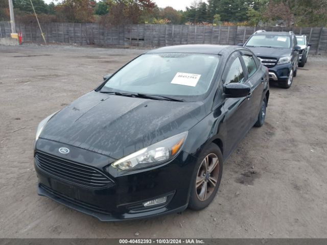 Photo 1 VIN: 1FADP3FE7JL213759 - FORD FOCUS 