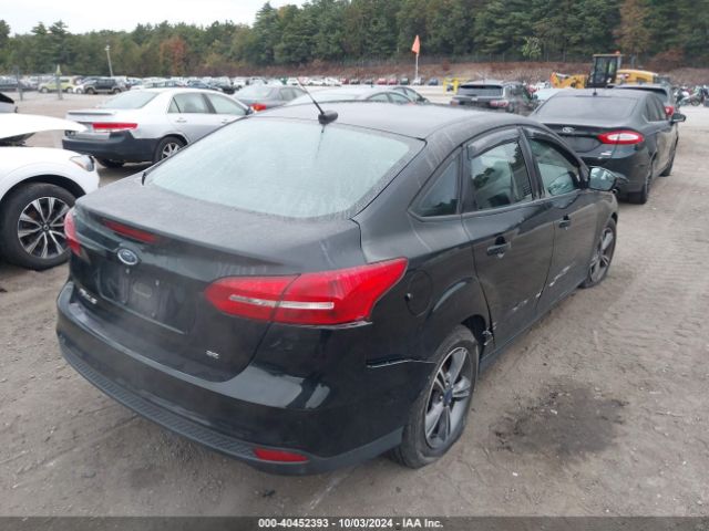 Photo 3 VIN: 1FADP3FE7JL213759 - FORD FOCUS 