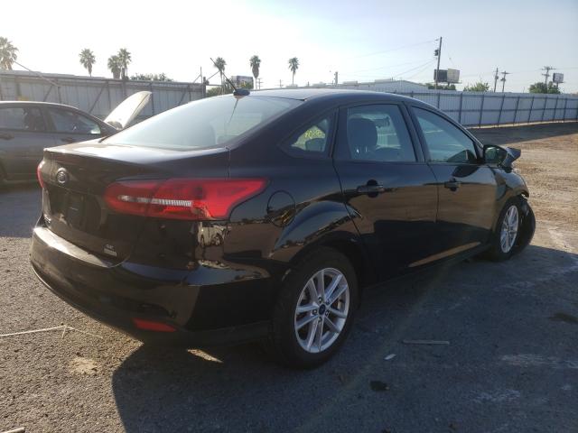 Photo 3 VIN: 1FADP3FE7JL226737 - FORD FOCUS SE 