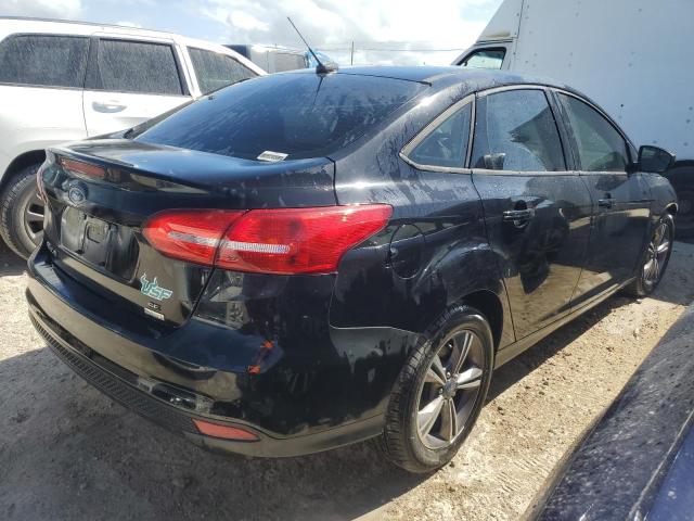 Photo 2 VIN: 1FADP3FE7JL229282 - FORD FOCUS SE 