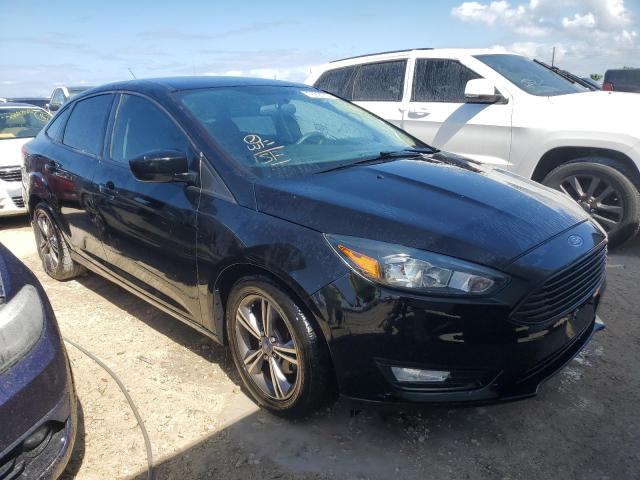 Photo 3 VIN: 1FADP3FE7JL229282 - FORD FOCUS SE 