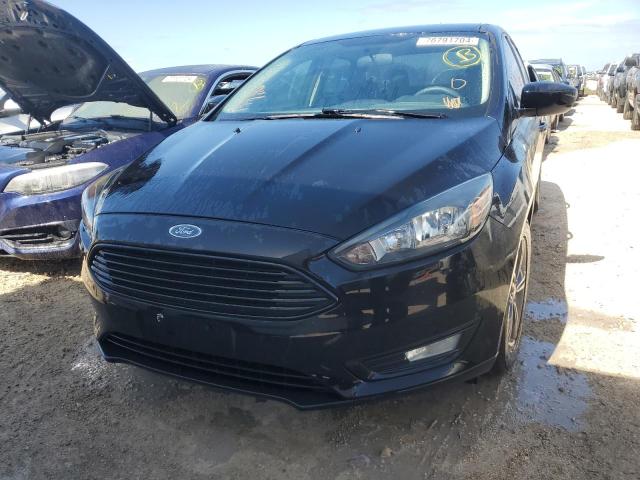 Photo 4 VIN: 1FADP3FE7JL229282 - FORD FOCUS SE 