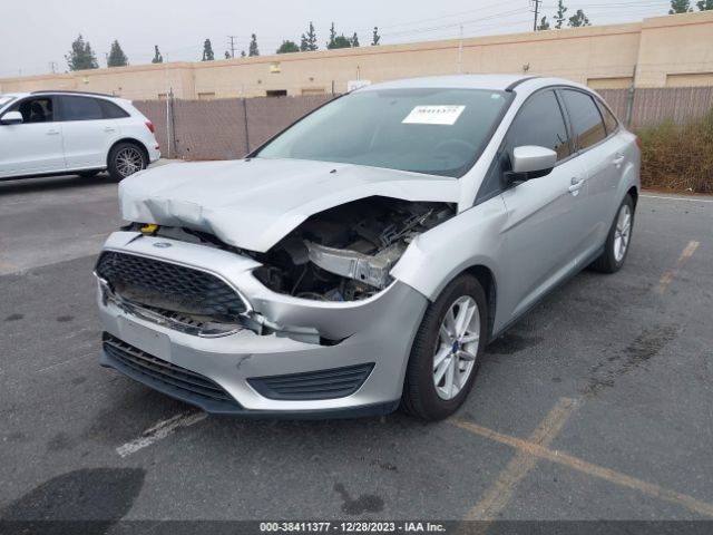 Photo 1 VIN: 1FADP3FE7JL230948 - FORD FOCUS 