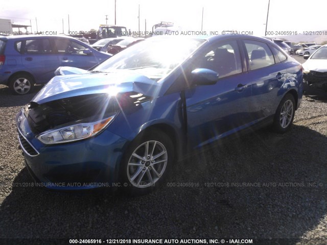 Photo 1 VIN: 1FADP3FE7JL230979 - FORD FOCUS 