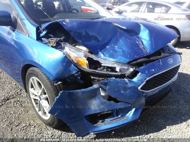 Photo 5 VIN: 1FADP3FE7JL230979 - FORD FOCUS 