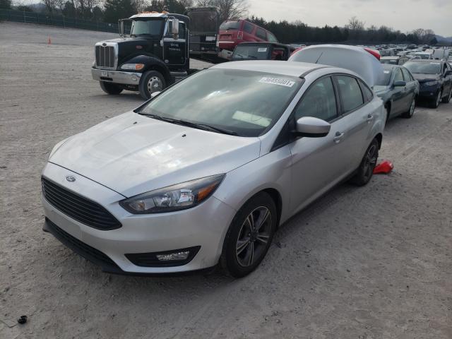 Photo 1 VIN: 1FADP3FE7JL255865 - FORD FOCUS SE 