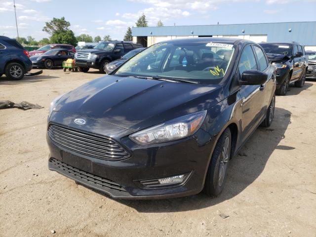 Photo 1 VIN: 1FADP3FE7JL292463 - FORD FOCUS SE 