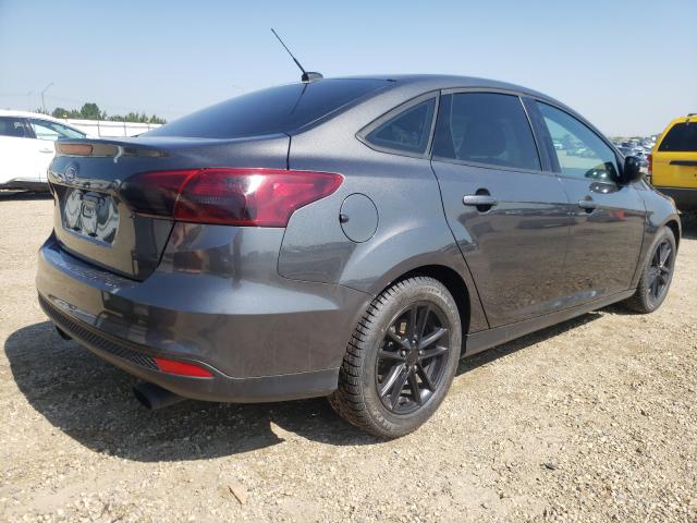 Photo 3 VIN: 1FADP3FE7JL297016 - FORD FOCUS SE 