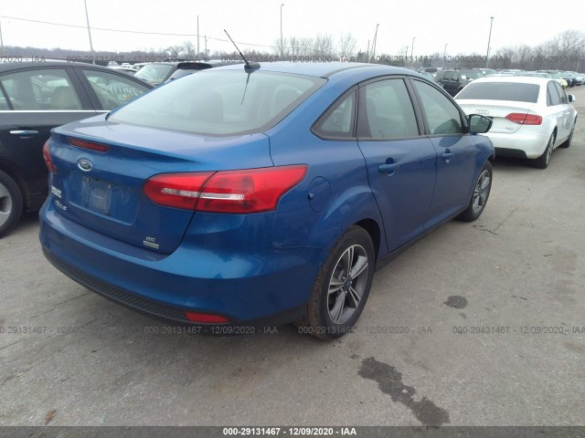 Photo 3 VIN: 1FADP3FE7JL301839 - FORD FOCUS 