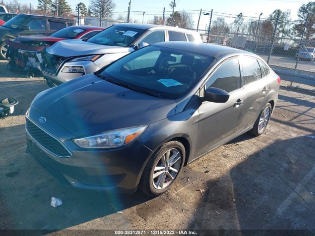 Photo 1 VIN: 1FADP3FE7JL331777 - FORD FOCUS 