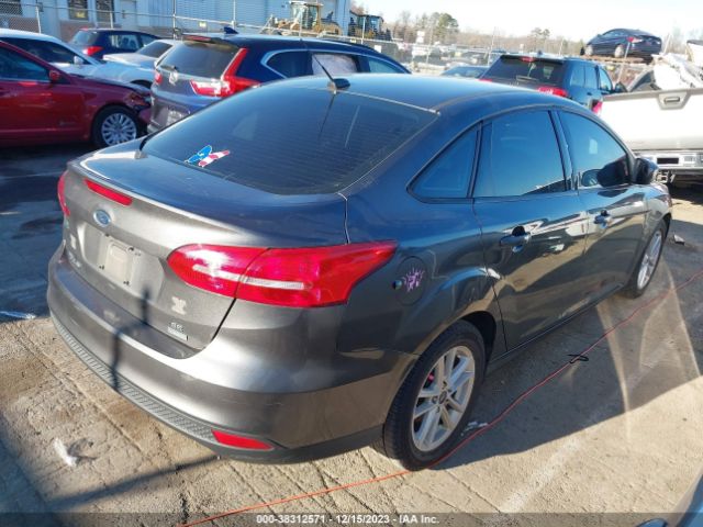 Photo 3 VIN: 1FADP3FE7JL331777 - FORD FOCUS 