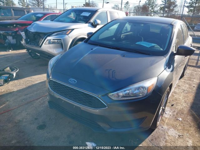 Photo 5 VIN: 1FADP3FE7JL331777 - FORD FOCUS 