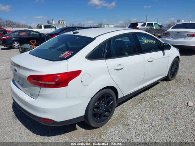 Photo 3 VIN: 1FADP3FE8GL257603 - FORD FOCUS 