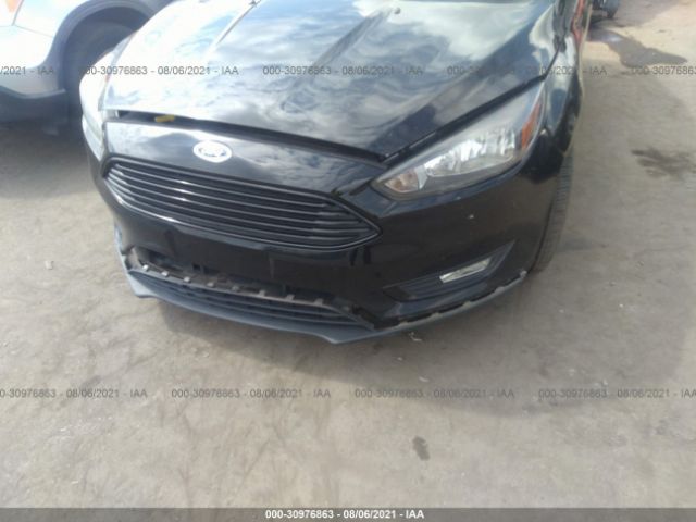 Photo 5 VIN: 1FADP3FE8GL332235 - FORD FOCUS 