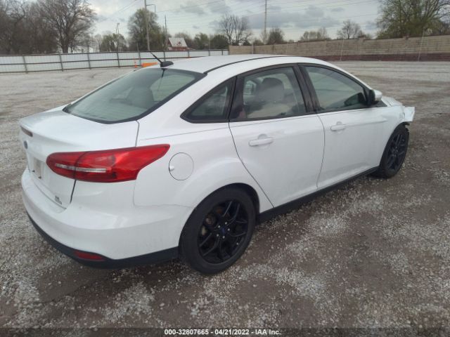 Photo 3 VIN: 1FADP3FE8GL361377 - FORD FOCUS 