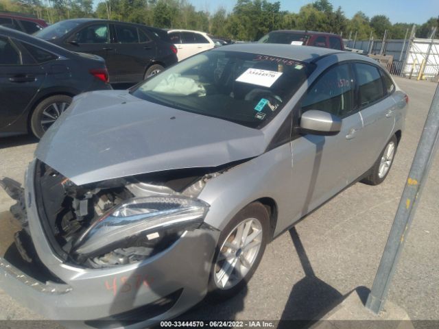 Photo 1 VIN: 1FADP3FE8JL268009 - FORD FOCUS 