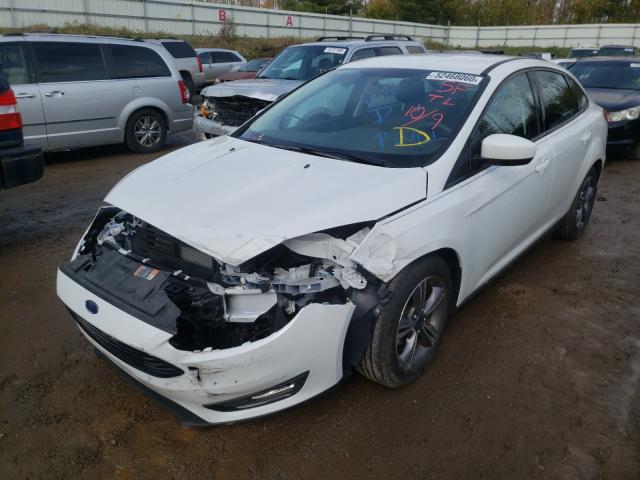 Photo 1 VIN: 1FADP3FE8JL286493 - FORD FOCUS SE 