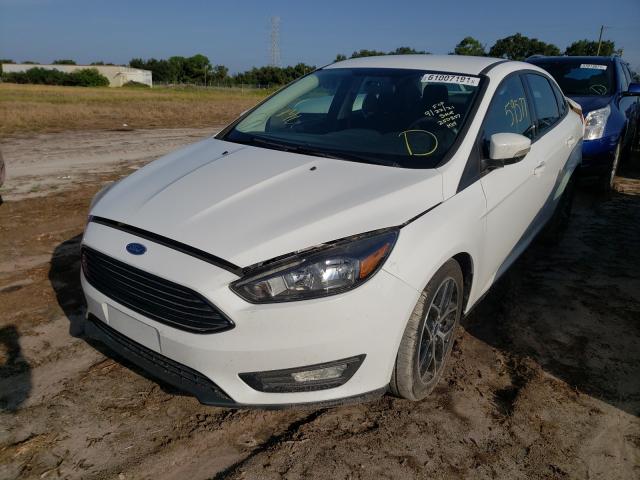 Photo 1 VIN: 1FADP3FE9HL275058 - FORD FOCUS SE 