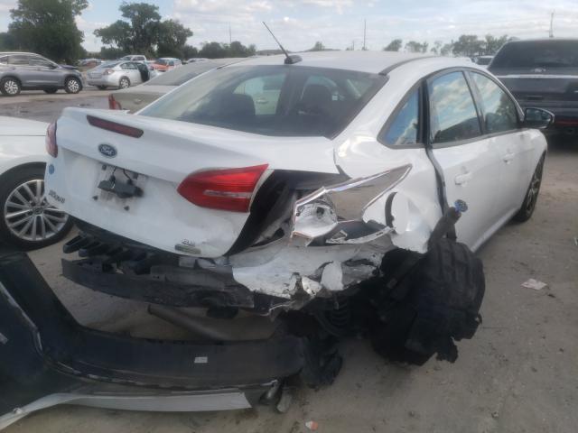 Photo 3 VIN: 1FADP3FE9HL275058 - FORD FOCUS SE 