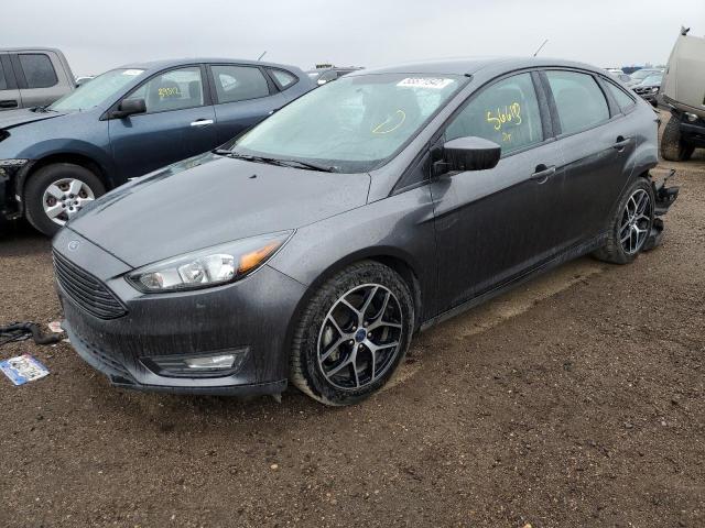 Photo 1 VIN: 1FADP3FE9JL277849 - FORD FOCUS SE 