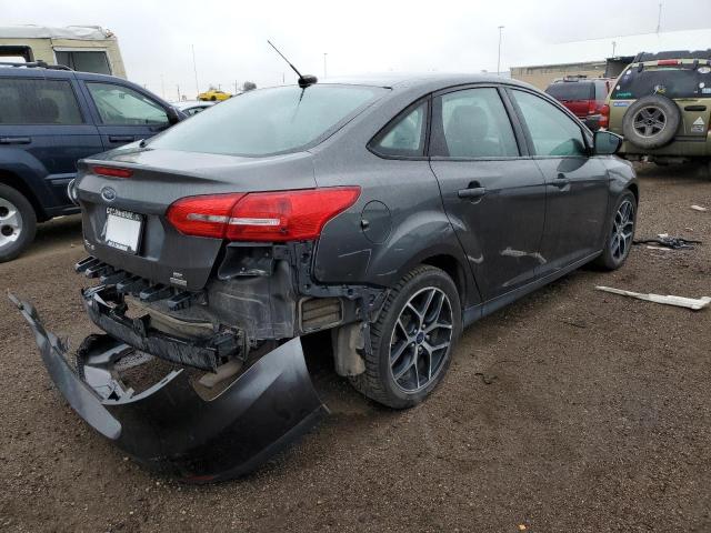 Photo 3 VIN: 1FADP3FE9JL277849 - FORD FOCUS SE 