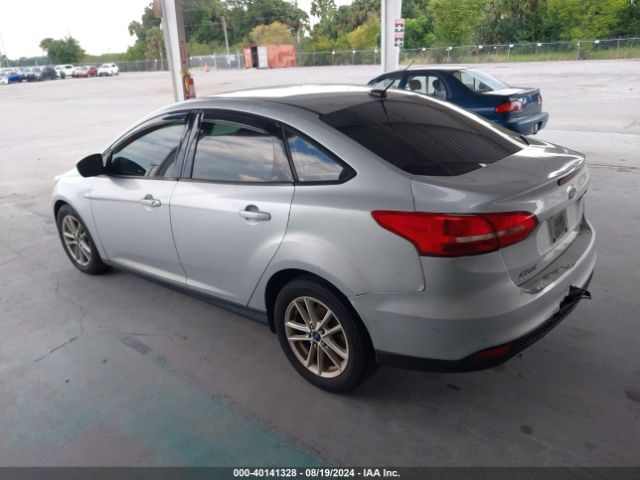 Photo 2 VIN: 1FADP3FE9JL281836 - FORD FOCUS 