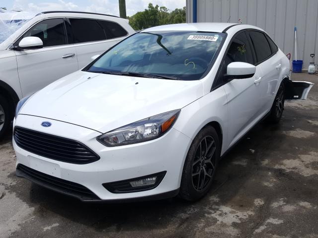 Photo 1 VIN: 1FADP3FE9JL284896 - FORD FOCUS SE 