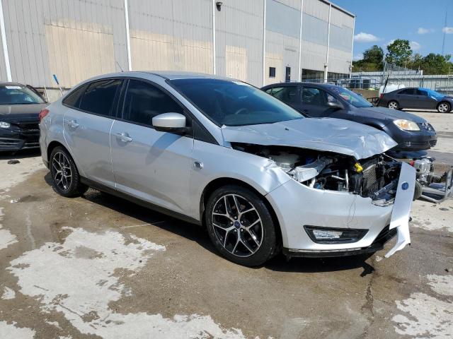 Photo 3 VIN: 1FADP3FE9JL301177 - FORD FOCUS SE 