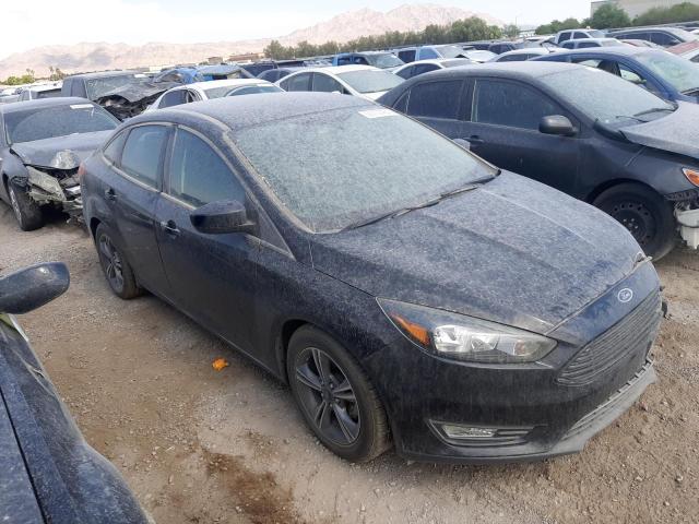 Photo 3 VIN: 1FADP3FE9JL304080 - FORD FOCUS 