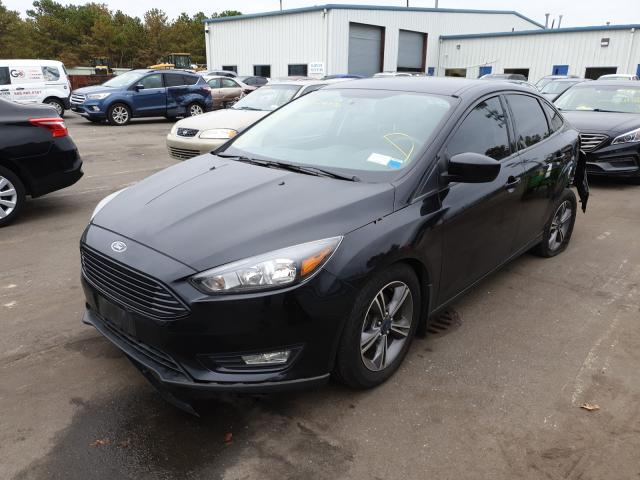 Photo 1 VIN: 1FADP3FE9JL306640 - FORD FOCUS SE 