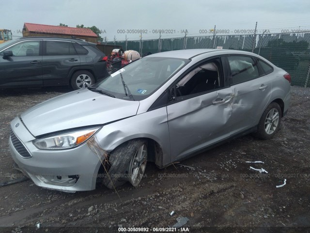 Photo 1 VIN: 1FADP3FE9JL310588 - FORD FOCUS 