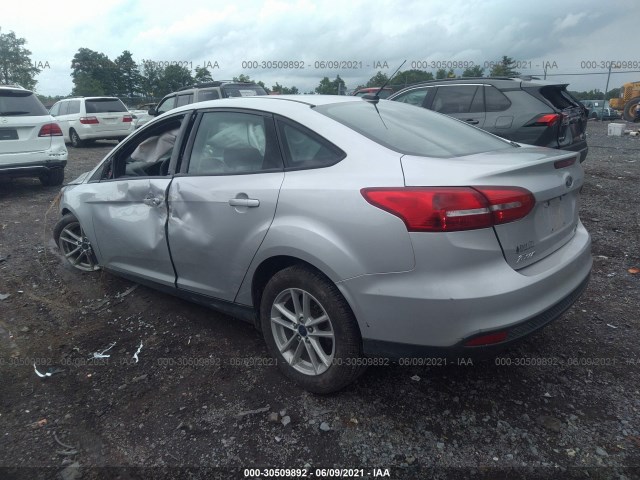 Photo 2 VIN: 1FADP3FE9JL310588 - FORD FOCUS 