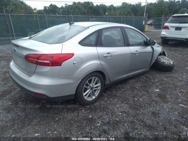 Photo 3 VIN: 1FADP3FE9JL310588 - FORD FOCUS 